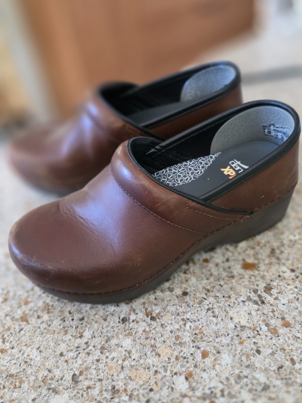 Dansko Brown Leather Slip-On Clog with Black Trim